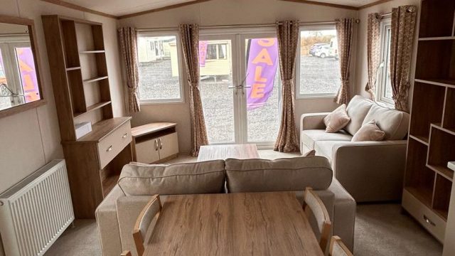 dining table with 4 chairs , view into lounge area