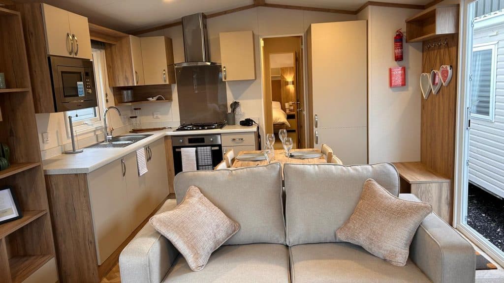 view of kitchen with built in cabinets, microwave.