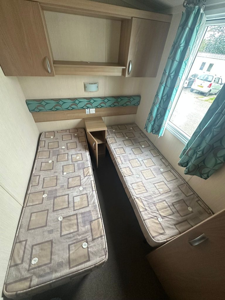 2 single beds in a room