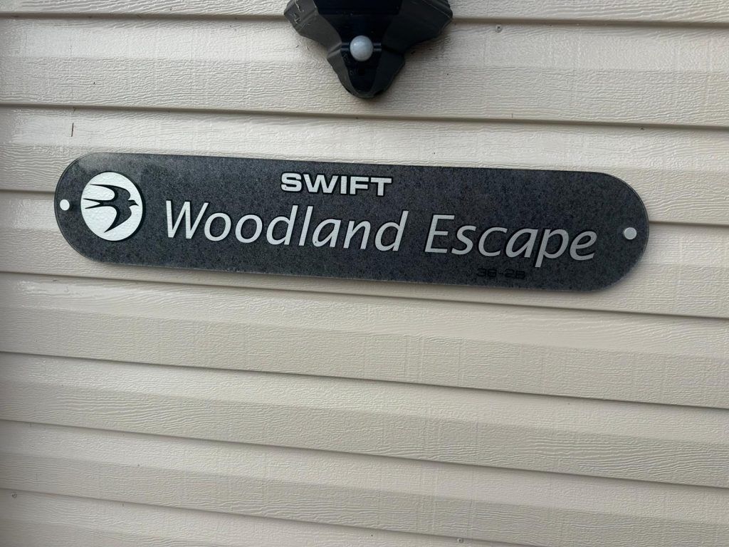 sign on outside of static caravan