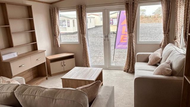 2 sofas in living room with patio doors