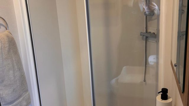 shower cubicle with hand basin