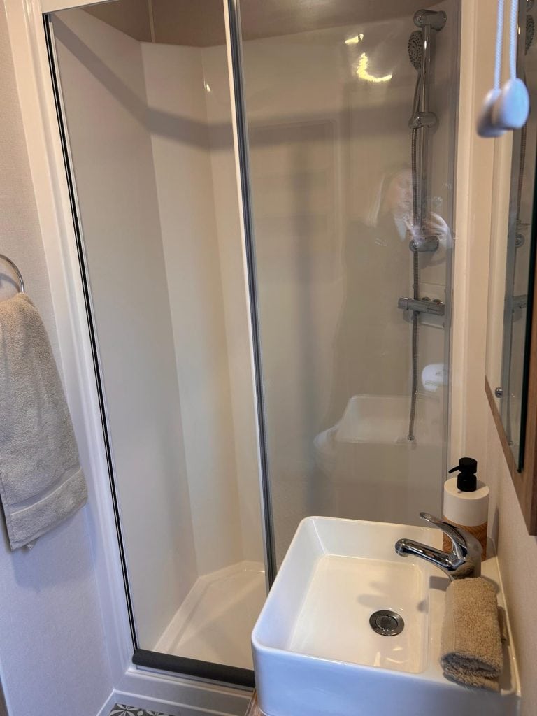shower cubicle with hand basin