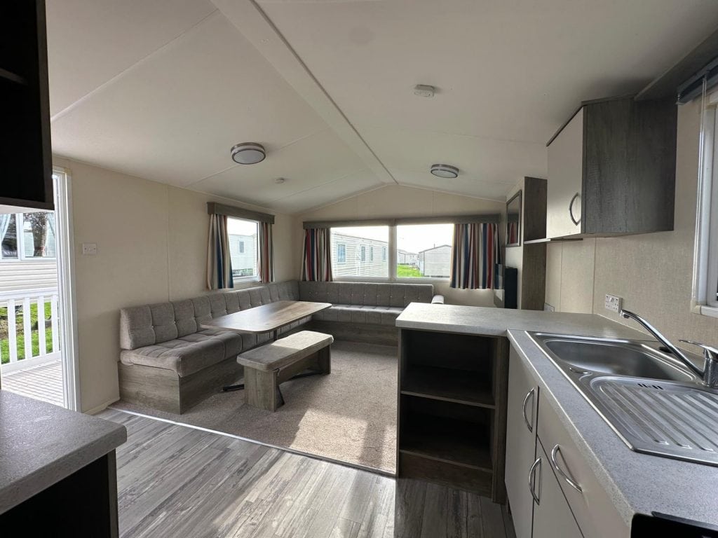 dining table with stool and seating, carpet in lounge