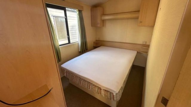 double bed with over head storage