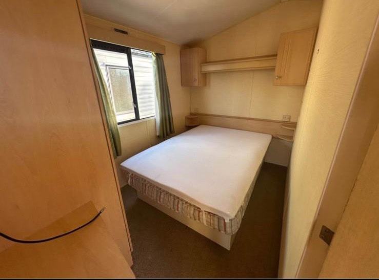 double bed with over head storage