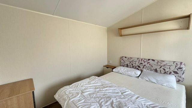 double bed with bedding on